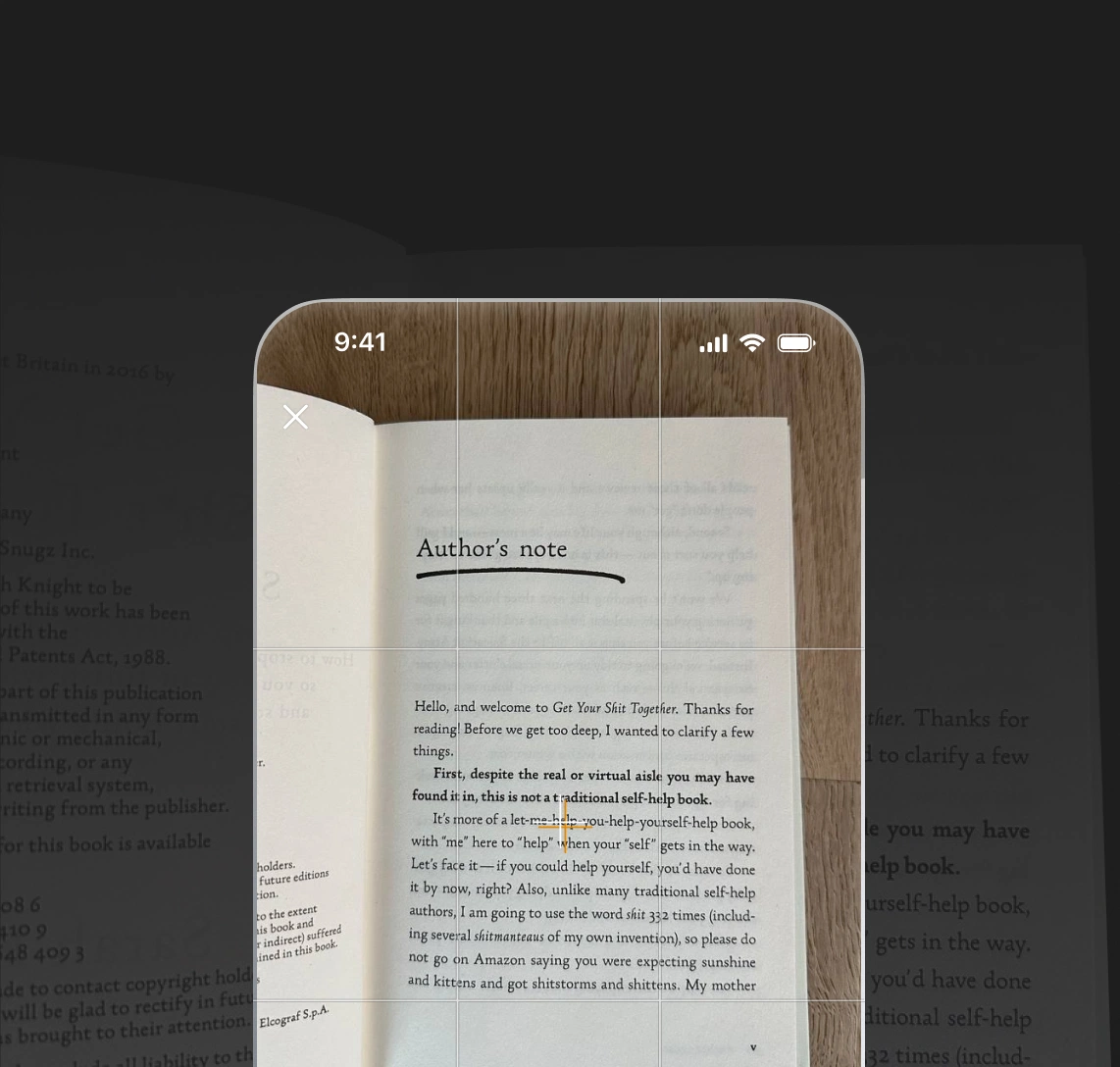 Phone screen scanning a book page titled Author’s note